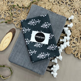 Light Grey Handloom Cotton Saree With Black Leaf Print Blouse