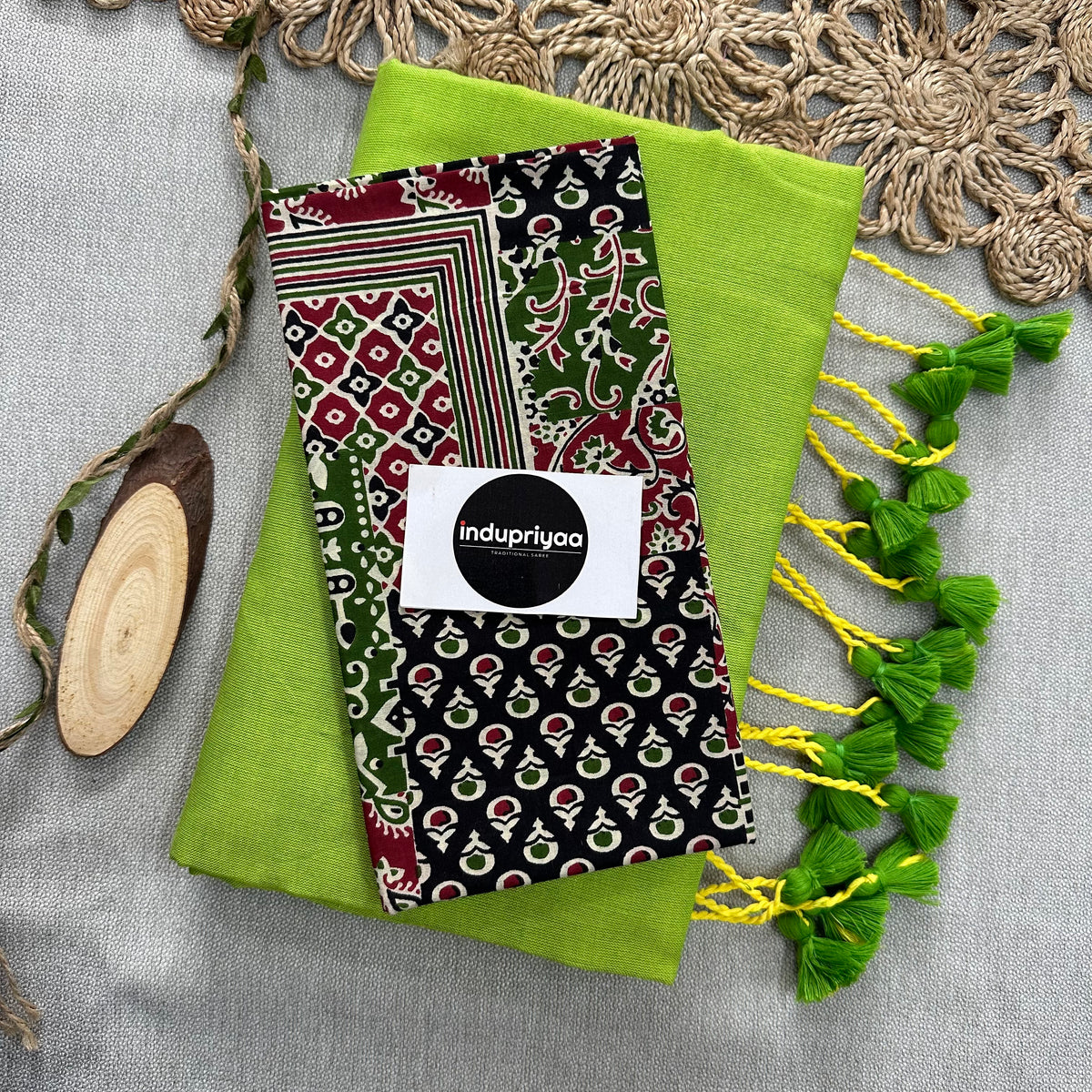 Perrot Green Handloom Cotton Saree With Multiple Print Blouse