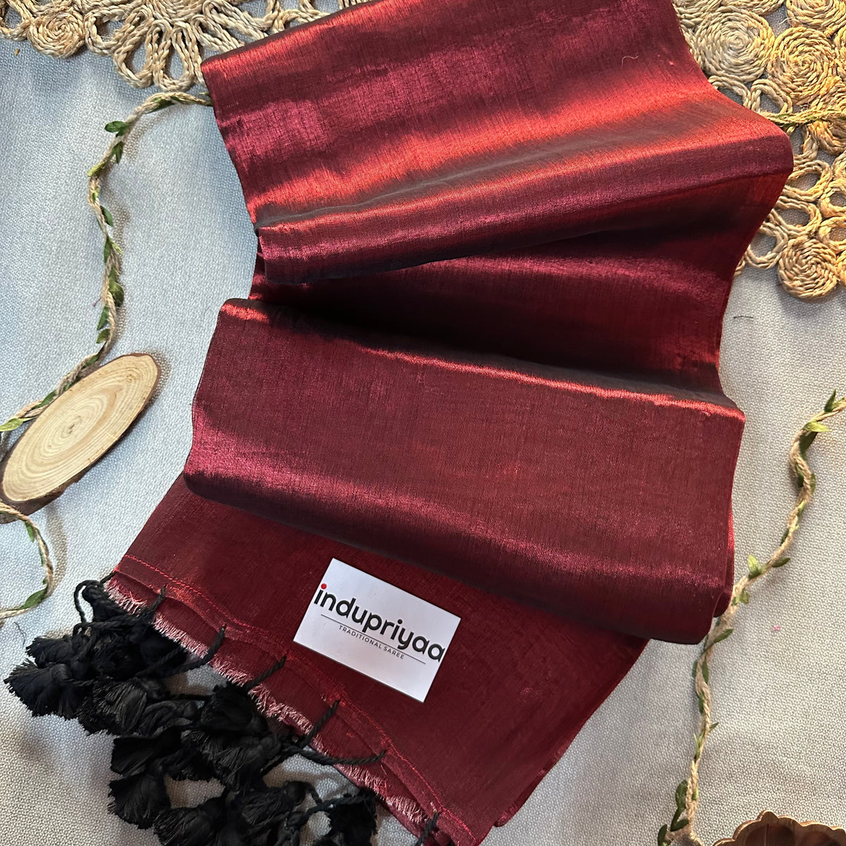 Indupriyaa Maroon Pom Pom Handloom Raga Tissue Saree