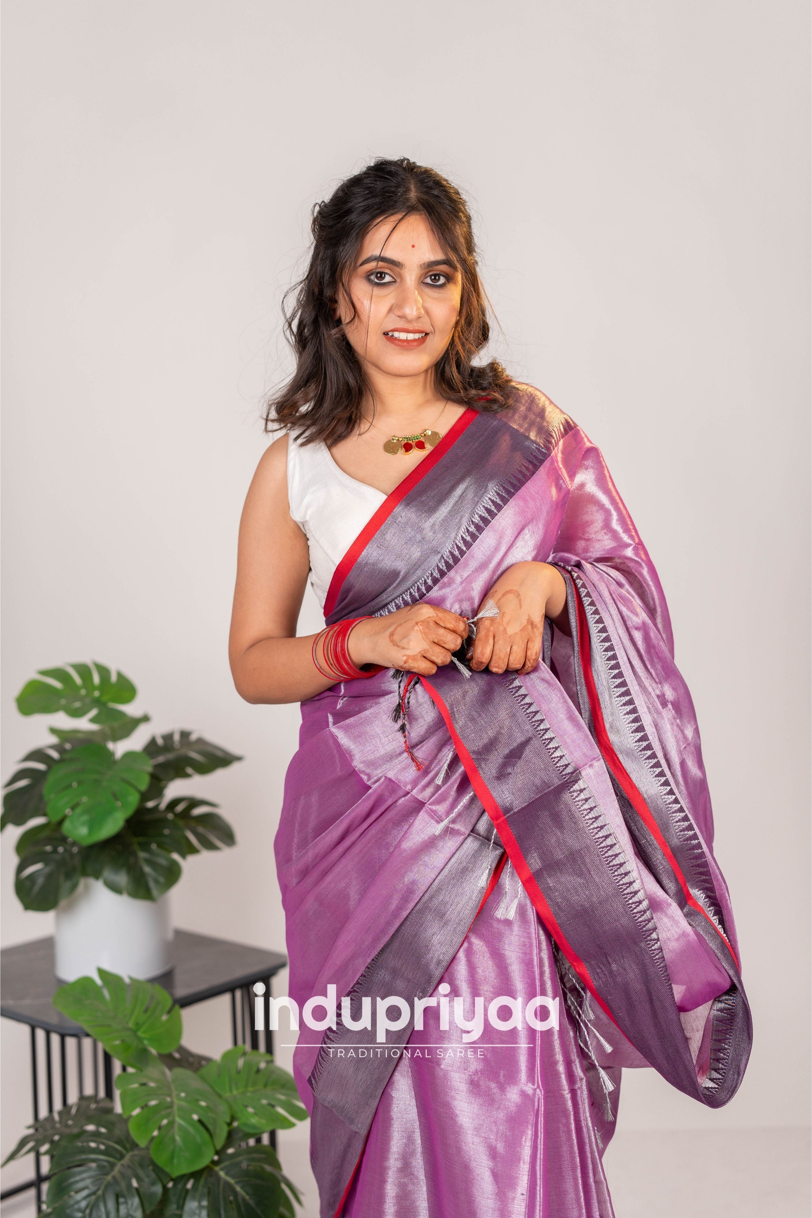 Indupriyaa  Lavender Handloom Raga Tissue Saree