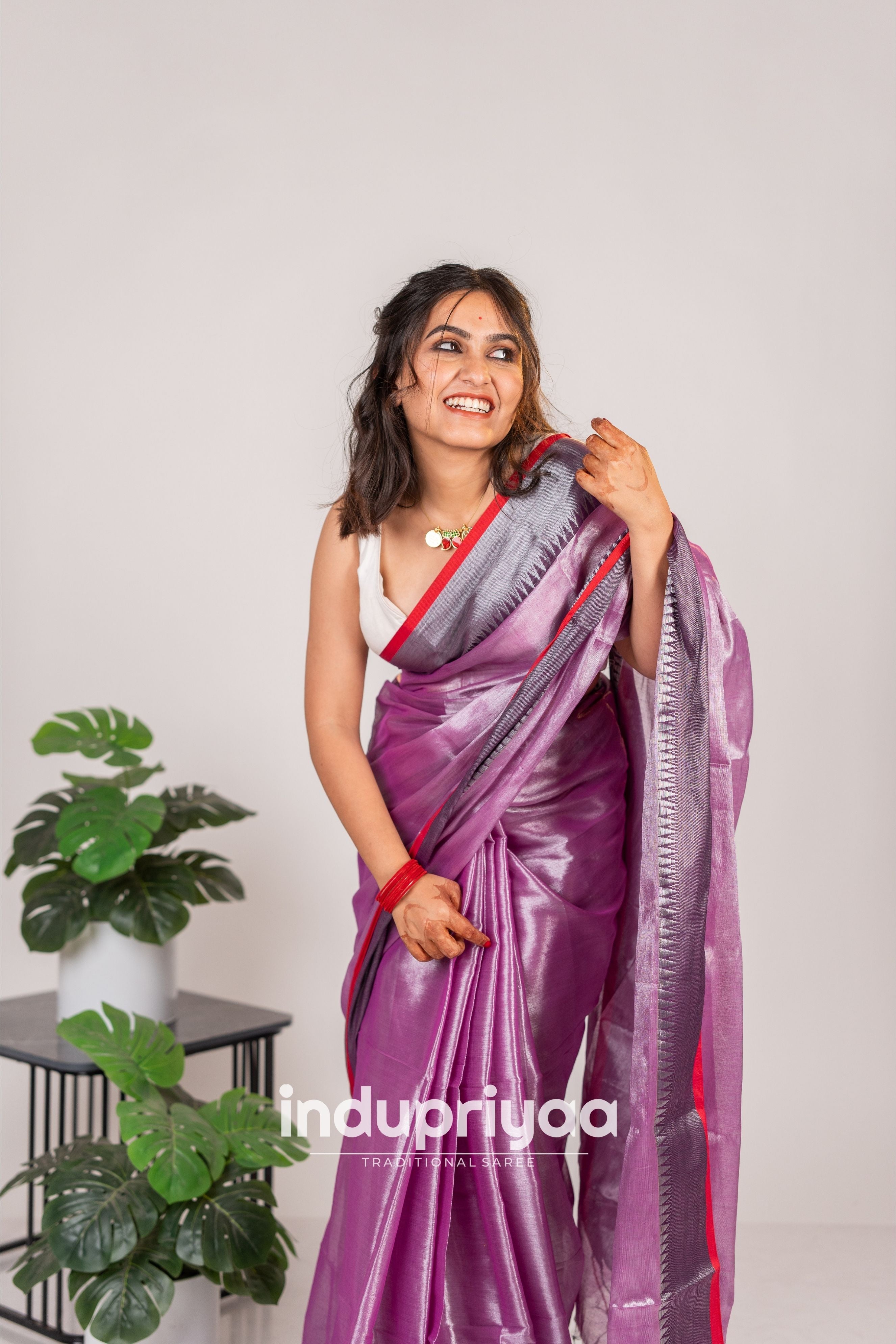 Indupriyaa  Lavender Handloom Raga Tissue Saree