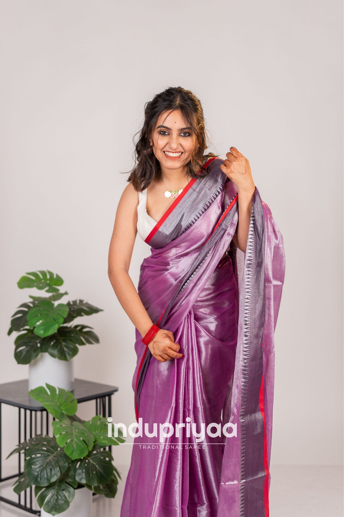 Indupriyaa  Lavender Handloom Raga Tissue Saree