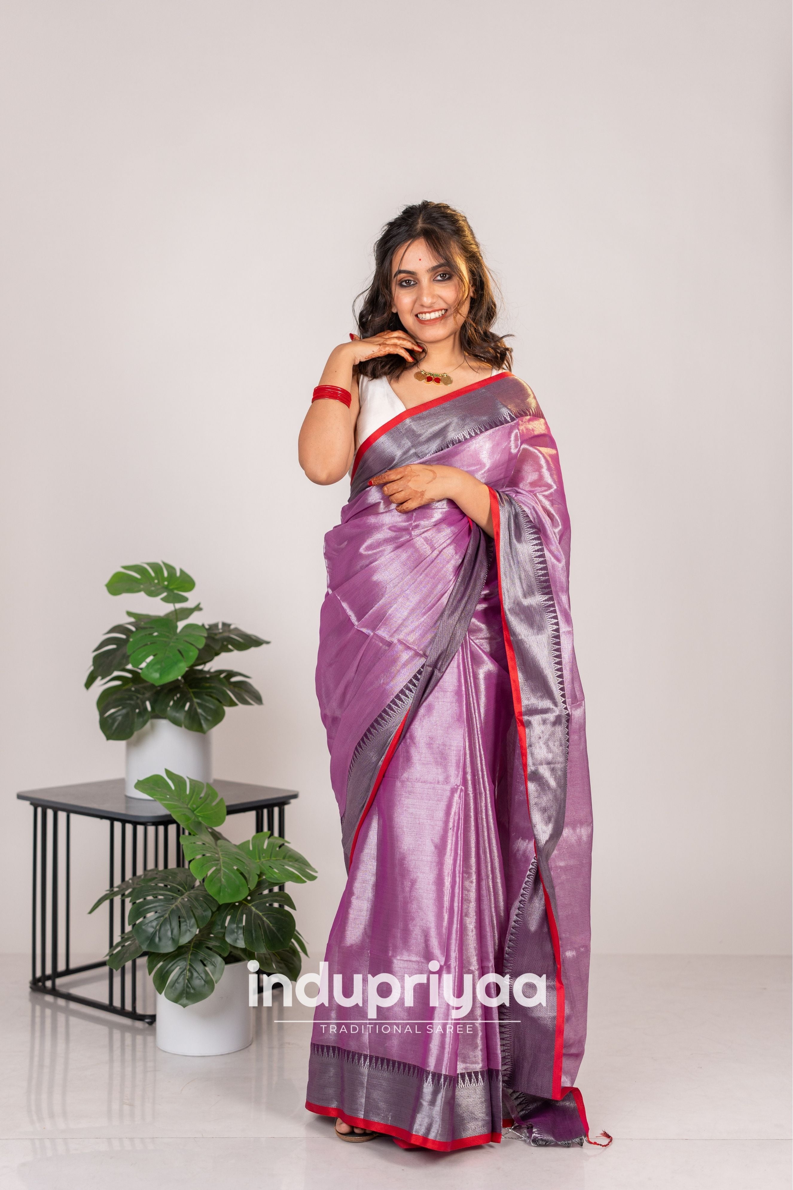 Indupriyaa  Lavender Handloom Raga Tissue Saree