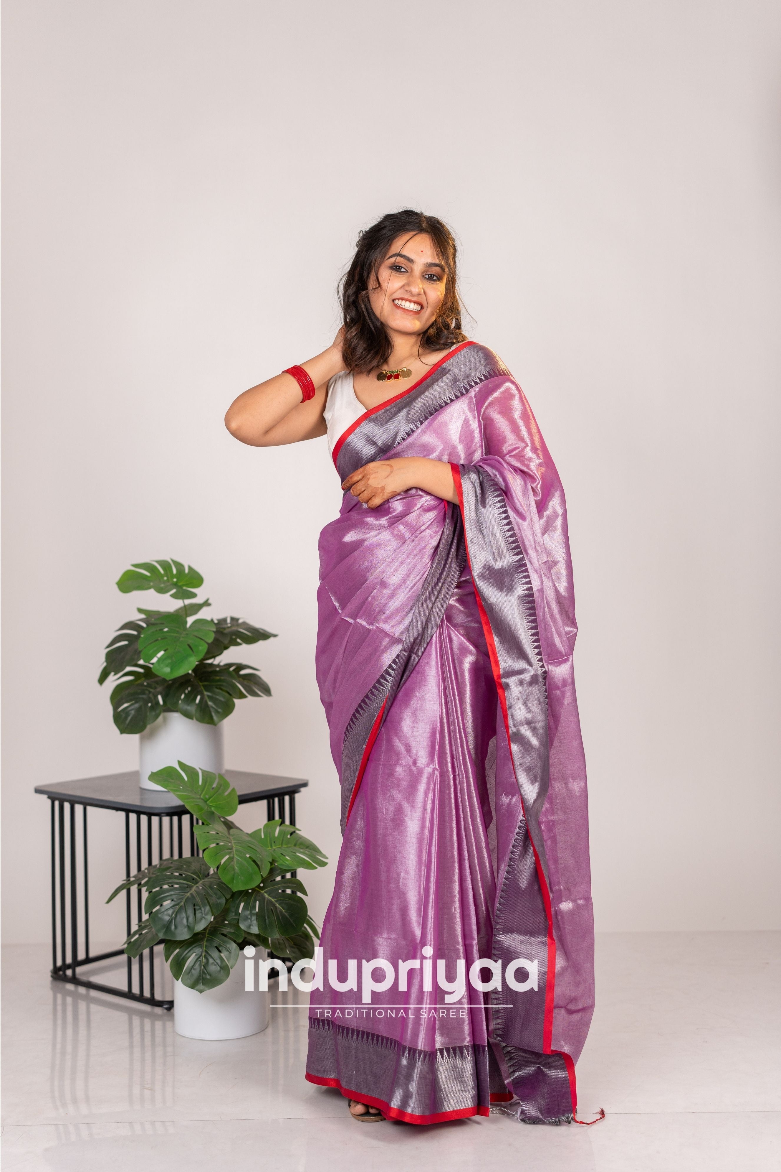 Indupriyaa  Lavender Handloom Raga Tissue Saree