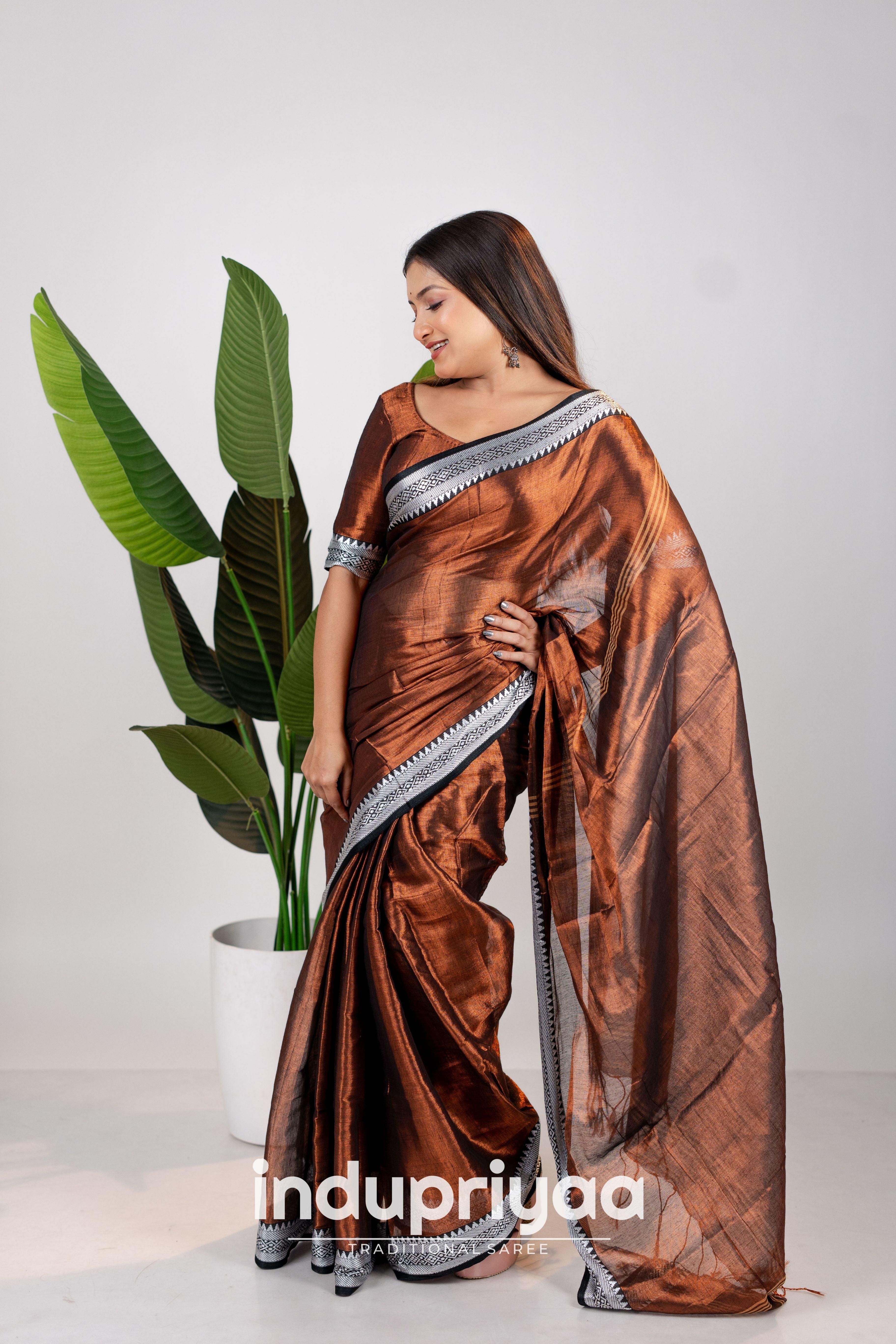 Indupriyaa Copper Temple Designe Handloom Tissue Cotton Saree